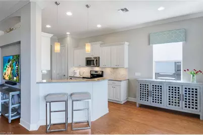 8835 Nautical Landing Cir #201, Naples, FL 34120 - Photo 15