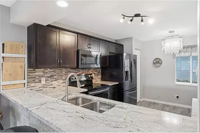 800 New Waterford Dr #A103, Naples, FL 34104 - Photo 9