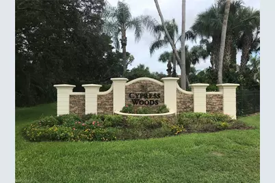 2855 Cypress Trace Circle Cir NW #202, Naples, FL 34119 - Photo 1