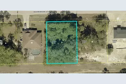 1128 Ravenswood St E, Lehigh Acres, FL 33974 - Photo 1