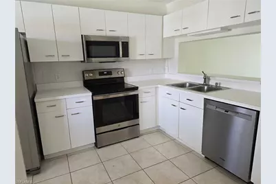 7725 Jewel Ln #202, Naples, FL 34109 - Photo 17