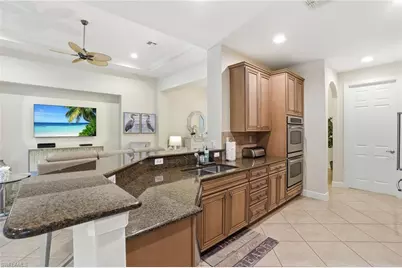 7687 Martino Cir, Naples, FL 34112 - Photo 9