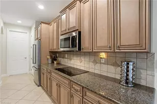 7687 Martino Cir, Naples, FL 34112 - Photo 11