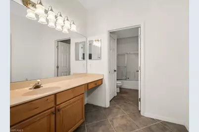 5890 Bur Oaks Ln, Naples, FL 34119 - Photo 11