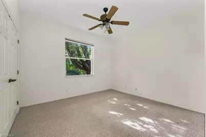 5890 Bur Oaks Ln, Naples, FL 34119 - Photo 9