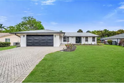 225 Pebble Beach Cir, Naples, FL 34113 - Photo 1