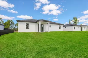 1122 Edelweiss St E, Lehigh Acres, FL 33974 - Photo 27