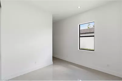 1122 Edelweiss St E, Lehigh Acres, FL 33974 - Photo 21