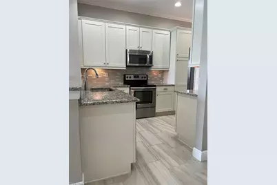 15114 Palmer Lake Cir #202, Naples, FL 34109 - Photo 3