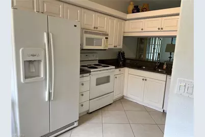 1240 Sarah Jean Cir #M102, Naples, FL 34110 - Photo 5