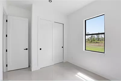 1124 Edelweiss St E, Lehigh Acres, FL 33974 - Photo 19