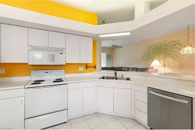 6927 Satinleaf Rd N #203, Naples, FL 34109 - Photo 13