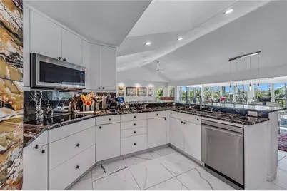 764 Eagle Creek Dr #301, Naples, FL 34113 - Photo 9