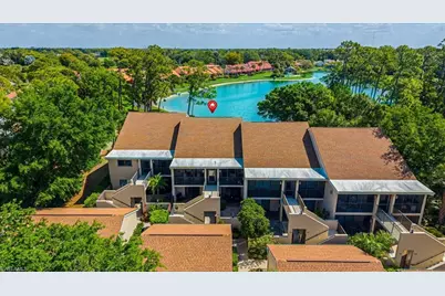 15450 Cedarwood Ln #202, Naples, FL 34110 - Photo 1