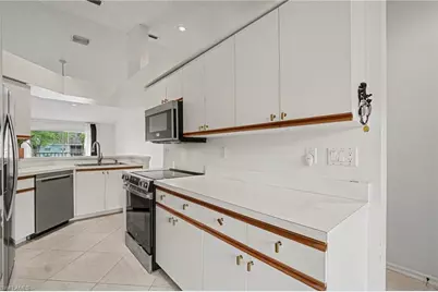 153 Wading Bird Cir #J201, Naples, FL 34110 - Photo 7