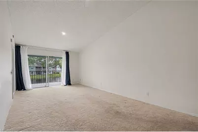 153 Wading Bird Cir #J201, Naples, FL 34110 - Photo 11