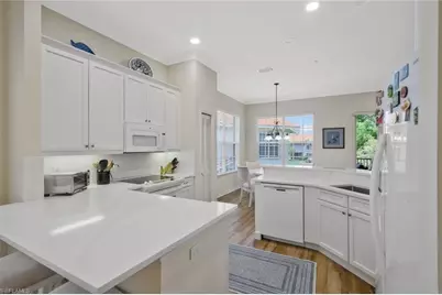 1036 Egrets Walk Cir #201, Naples, FL 34108 - Photo 7