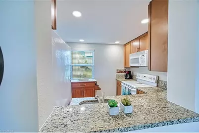 1624 Pine Valley Dr #211, Fort Myers, FL 33907 - Photo 7