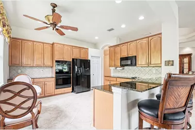 14809 Canton Ct, Naples, FL 34114 - Photo 15