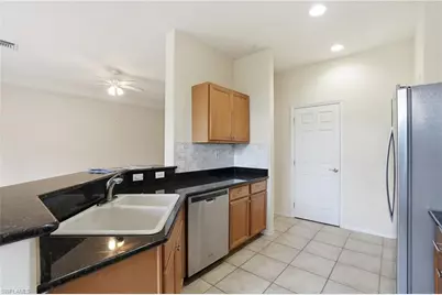 12854 Carrington Cir #7, Naples, FL 34105 - Photo 15