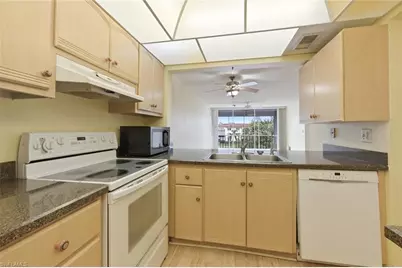 1087 Forest Lakes Dr #1-303, Naples, FL 34105 - Photo 9