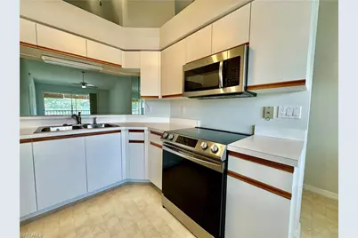 137 Wading Bird Cir #F-204, Naples, FL 34110 - Photo 9