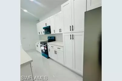 545 Trinity St E, Lehigh Acres, FL 33974 - Photo 7