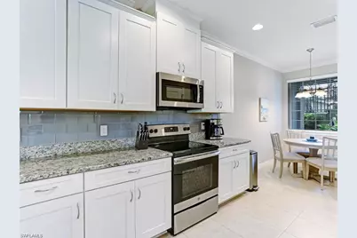 9378 Pocida Ct #101, Naples, FL 34119 - Photo 13