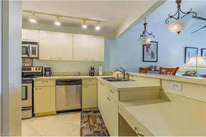 4410 Chantelle Dr #H-205, Naples, FL 34112 - Photo 7