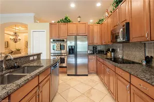 5725 Lago Villaggio Way, Naples, FL 34104 - Photo 29