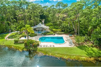 15475 Cedarwood Ln #203, Naples, FL 34110 - Photo 1