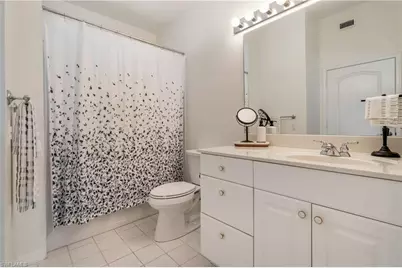 7686 Pebble Creek Cir #301, Naples, FL 34108 - Photo 9