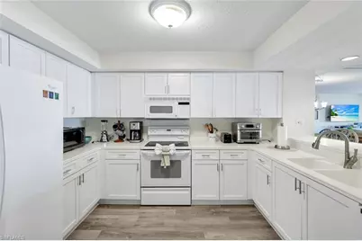 21 Bluebill Ave #B905, Naples, FL 34108 - Photo 9