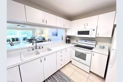 1051 Eastham Way #B104, Naples, FL 34104 - Photo 9