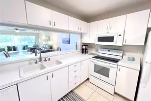 1051 Eastham Way, Naples, FL 34104 - Photo 9