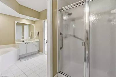7687 Pebble Creek Cir #301, Naples, FL 34108 - Photo 15