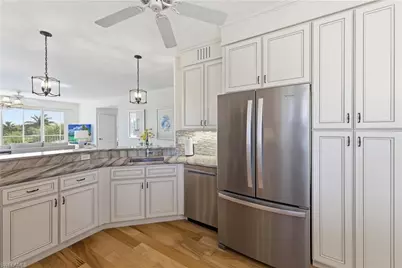 7687 Pebble Creek Cir #301, Naples, FL 34108 - Photo 9