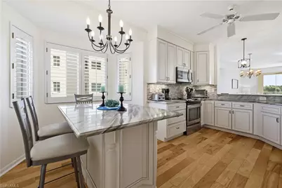 7687 Pebble Creek Cir #301, Naples, FL 34108 - Photo 11