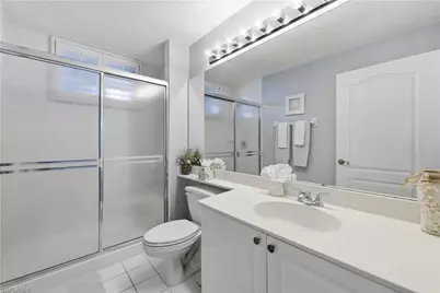 7687 Pebble Creek Cir #301, Naples, FL 34108 - Photo 21