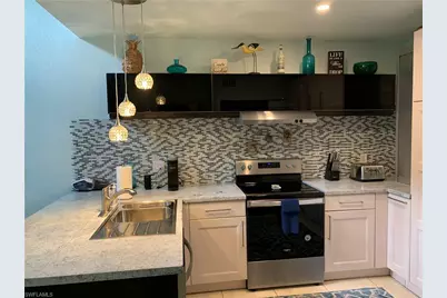 65 Emerald Woods Dr #E8, Naples, FL 34108 - Photo 5