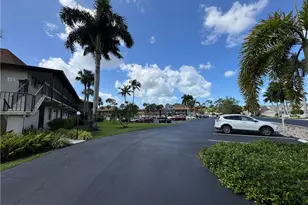 25398 Golf Lake Cir, Bonita Springs, FL 34135 - Photo 21