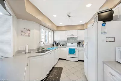 577 Beachwalk Cir #R203, Naples, FL 34108 - Photo 35