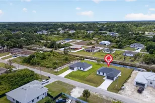 702 Carbon St E, Lehigh Acres, FL 33974 - Photo 25