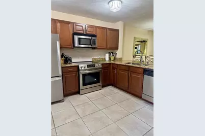 3062 Sandpiper Bay Cir #K102, Naples, FL 34112 - Photo 9
