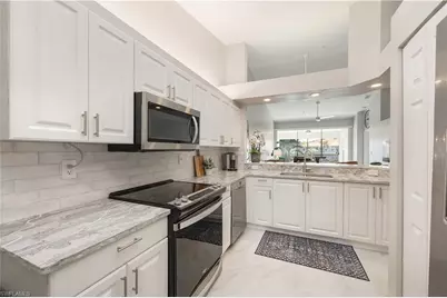 7564 Silver Trumpet Ln #U202, Naples, FL 34109 - Photo 11