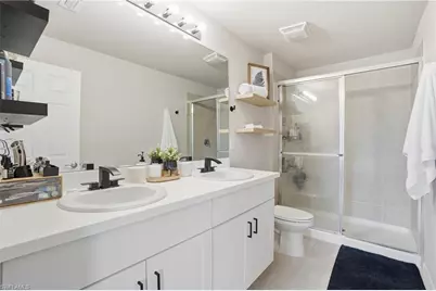 15453 Wildflower Cir, Naples, FL 34119 - Photo 17