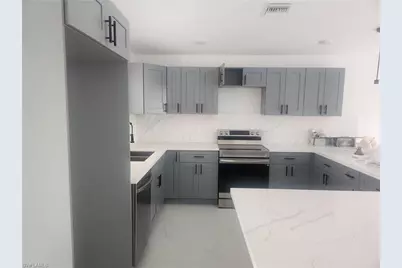 875 Cervantes St E, Lehigh Acres, FL 33974 - Photo 11