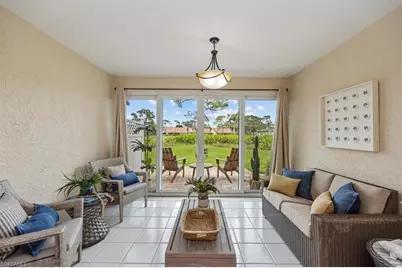 245 Deerwood Cir #12-8, Naples, FL 34113 - Photo 3