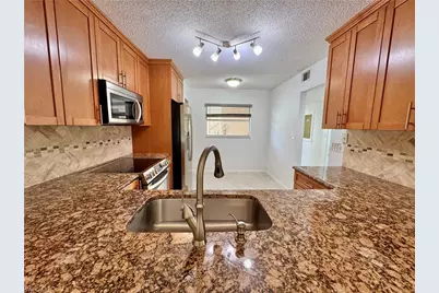 661 Squire Cir #101, Naples, FL 34104 - Photo 15