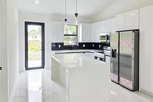 1411 Moore Ave, Lehigh Acres, FL 33972 - Photo 9
